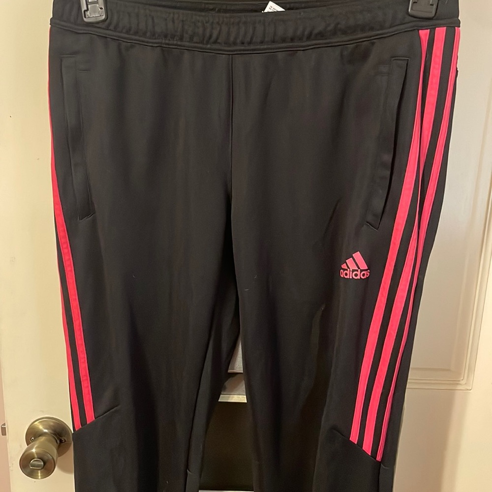 Black and pink adidas climacool sweats.